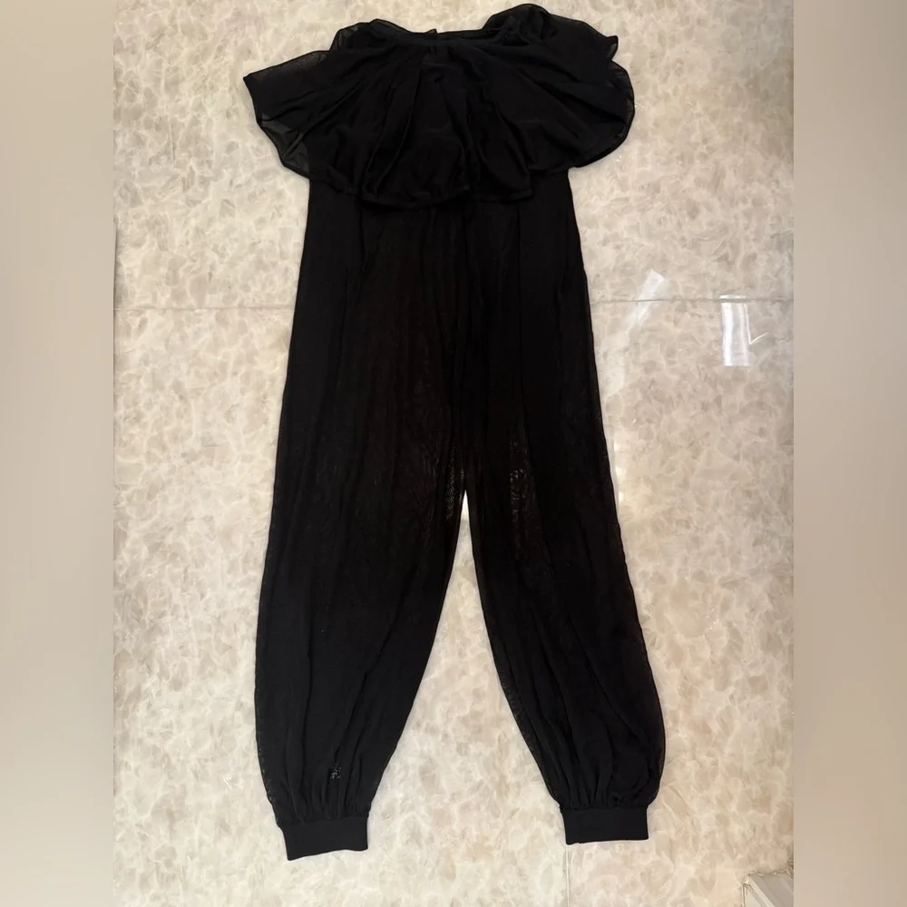 $3375 Alaia sheer peplum black balloon pants